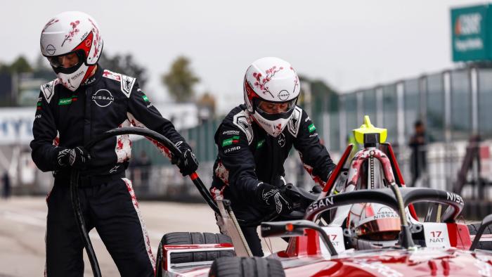 MADRID, SPAIN - NOVEMBER 07: Mechanics plug the charger into the car of Norman Nato of France and Nissan Formula E Team during day three of Formula E Pre-Season Testing at Circuito del Jarama on November 07, 2024 in Madrid, Spain.