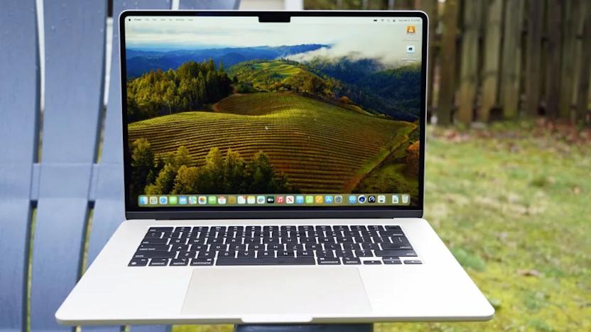 A M3 MacBook Air sitting on a chair outside.